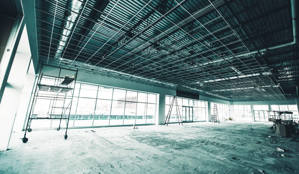 Warehouse Construction Site. Warehouse Interiors Under Construction. Commercial Remodeling.